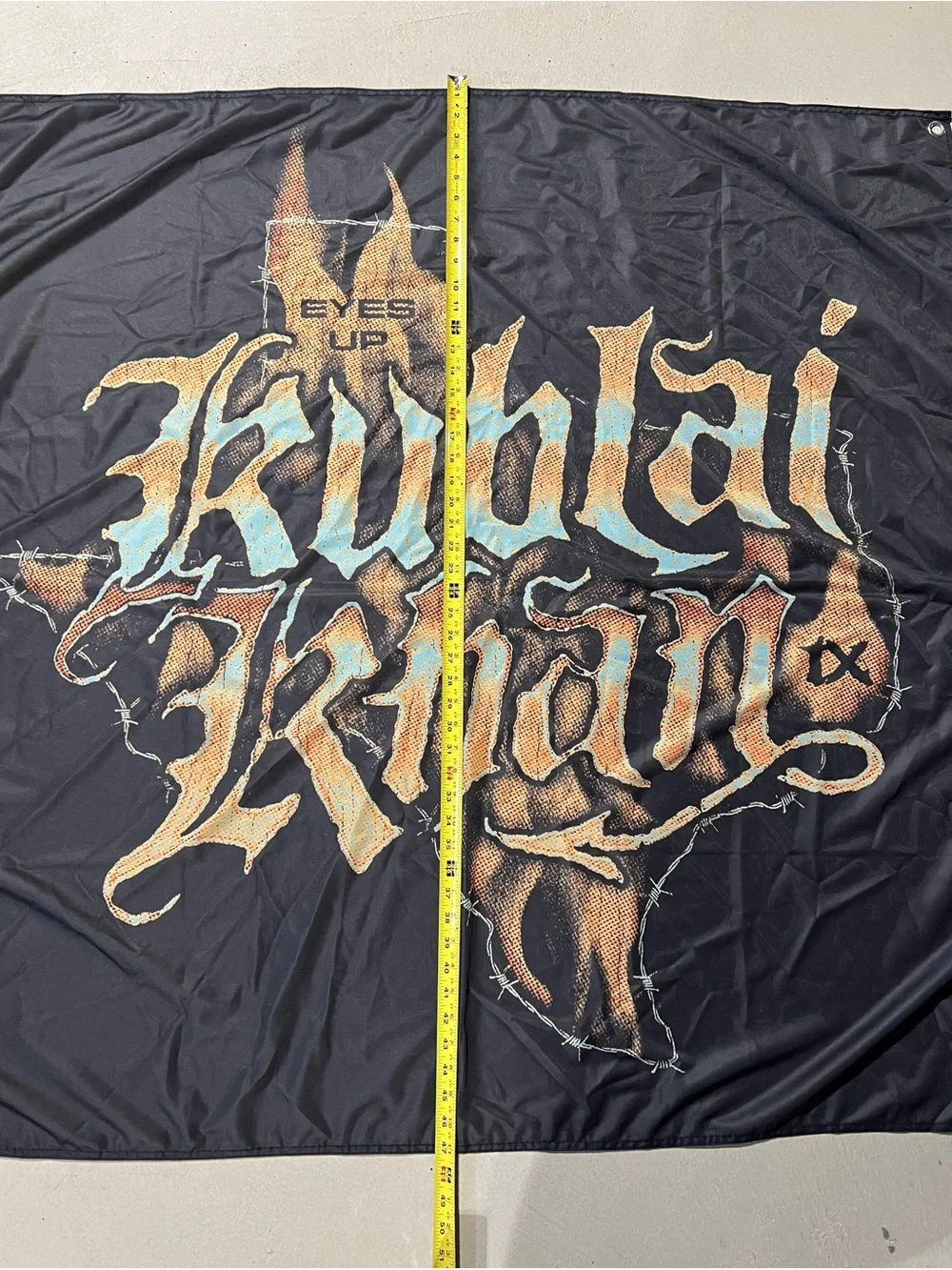 Kublai Khan TX Eyes Up Balancing Survival & Happiness Banner Flag - 4’ x 4’
